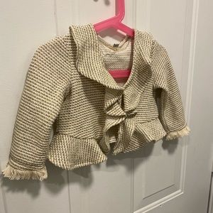 Ruffles blazer.